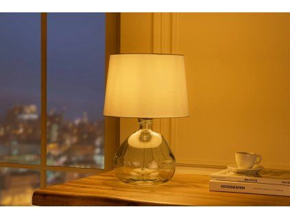 Kompaktní stolní lampa s průhledným skleněným podstavcem