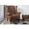 Luxusní hnědé křeslo Chesterfield ušák